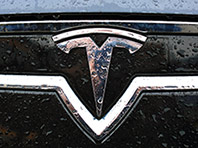 Акции Tesla Motors рухнули после объявления о покупке фирмы кузенов Маска - «Автоновости»