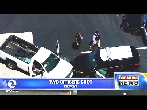 В США расстреляли патрульных полицейских  - «происшествия видео»